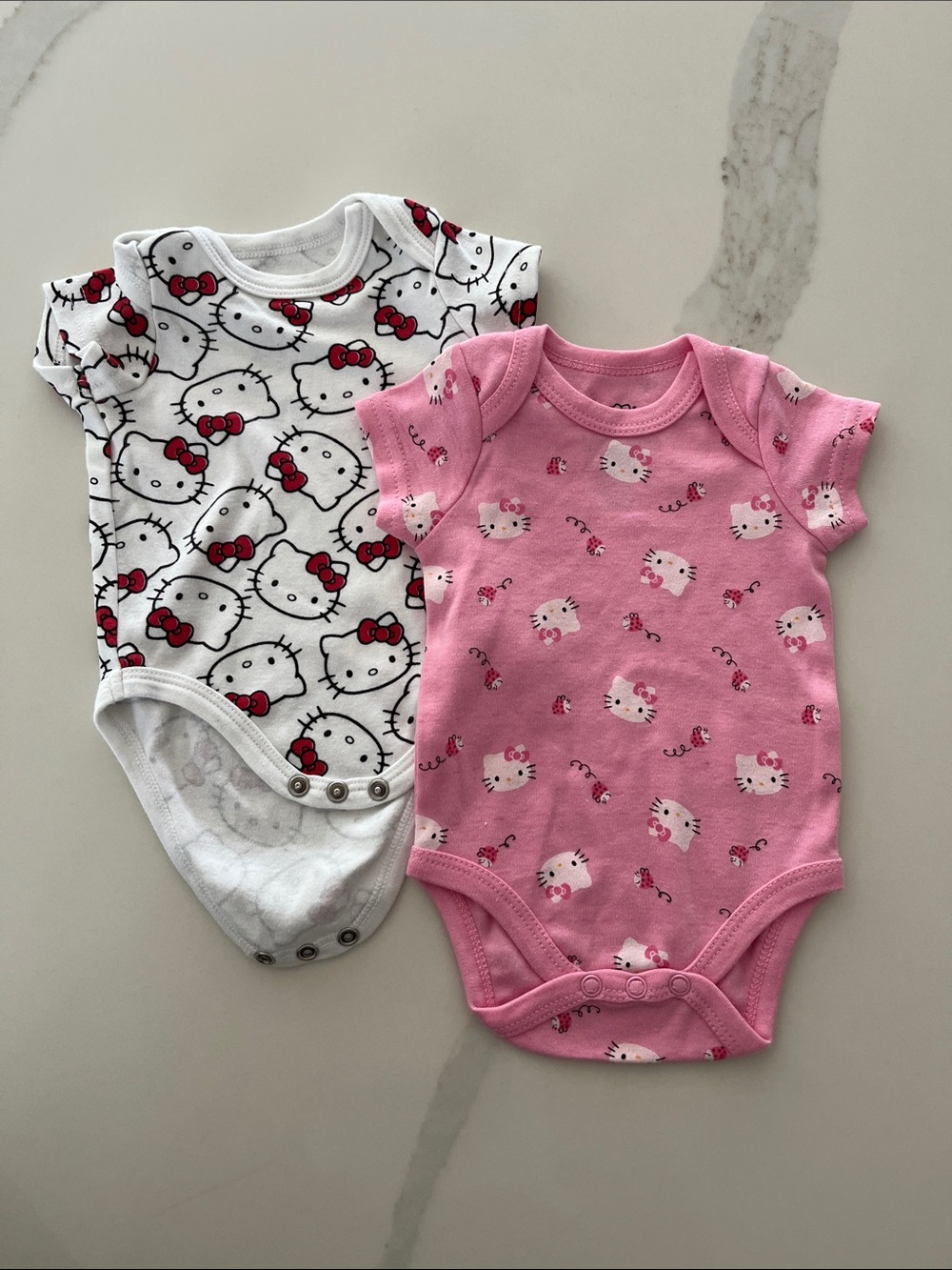 Hello Kitty White & Pink Baby One-Piece Bodysuit Duo